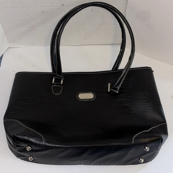 BOB MACKIE TOTE BAG VEGAN LEATHER
ZIPPER CLOSURE ON TOP
LINING INSIDE CLEAN - Picture 1 of 7